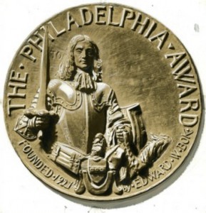 The Philadelphia Award medal depicts William Penn on this side and Jesus on the other, with the words, “I am among you as he that serveth.”